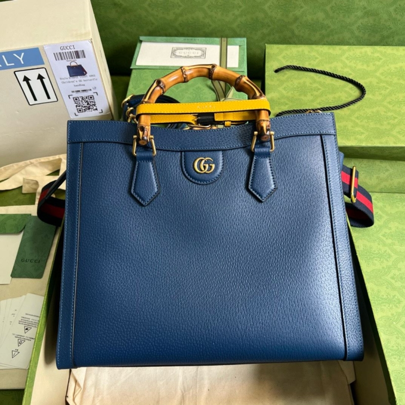 G*u*i top handle bags